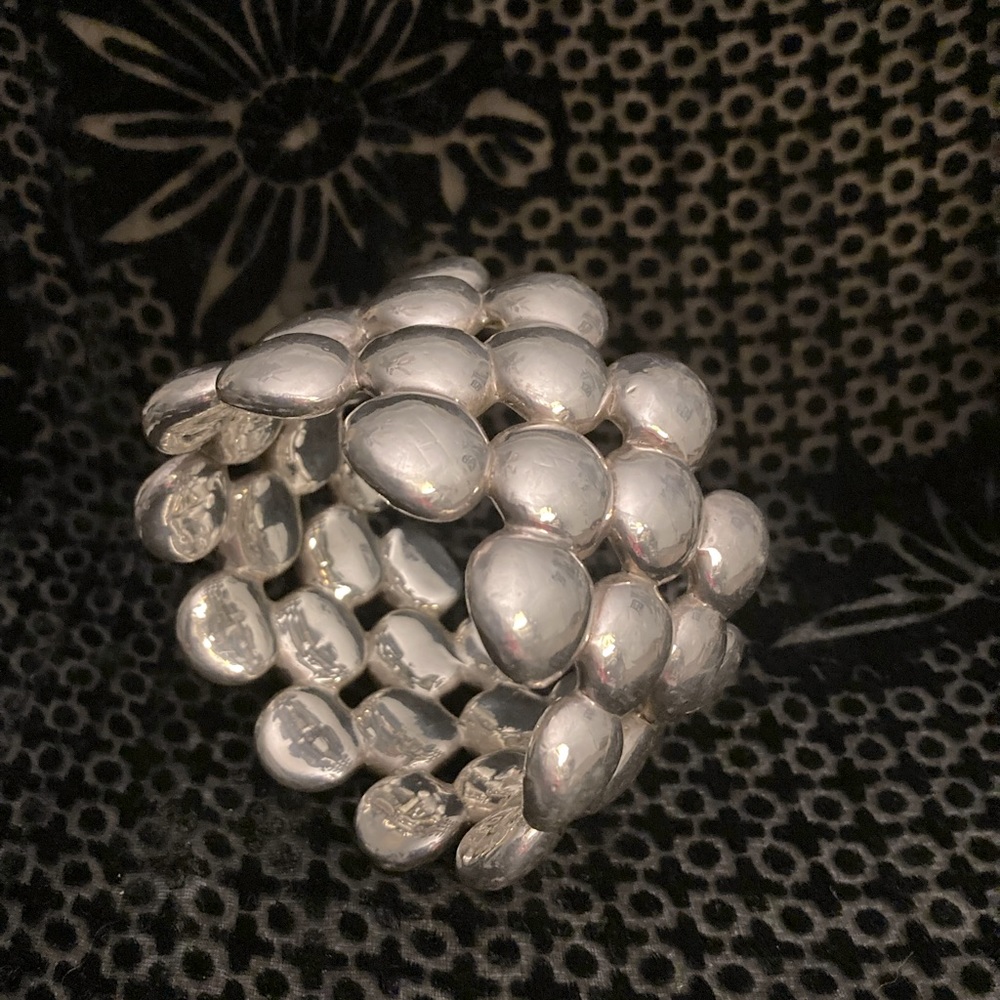 Sterling Silver bangle. This is a statement piece! It’s 2 inches wide.